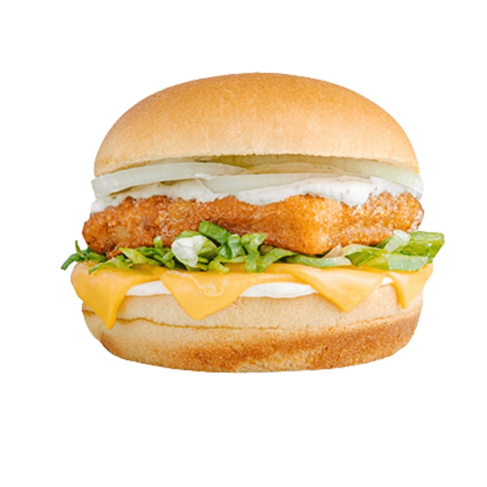 A Banana King fish sandwich with cheese, lettuce, onions, and tartar sauce on a bun.