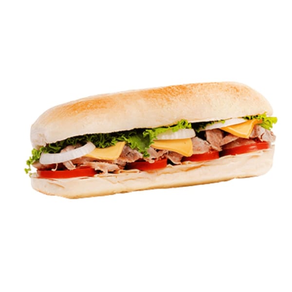 Banana King's sub sandwich with meat, cheese, lettuce, onions, and tomatoes on a white background.