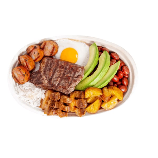 A fast-food platter with steak, sausage, fried egg, avocado, beans, rice, and fried plantains.